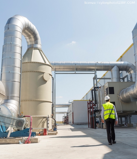 New modern industrial waste plant pipelines from the outside. Waste-to-energy plant. Produces electricity and heat directly through combustion. Produces a combustible fuel commodity, such as methane, methanol, ethanol and synthetic fuels.
